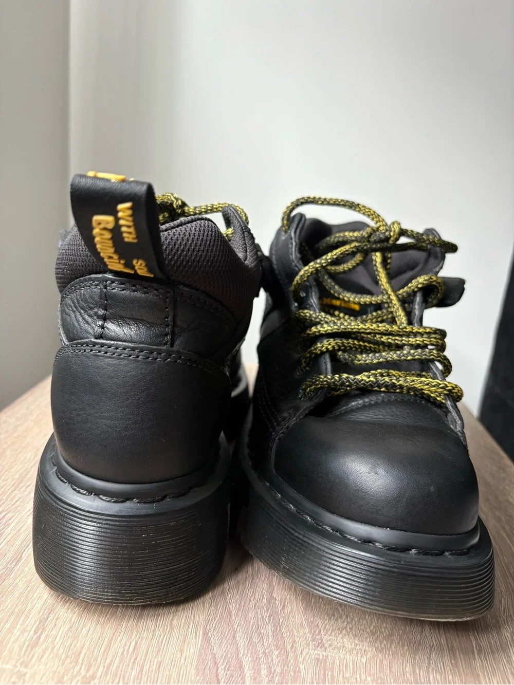 Dr. Martens Black Leather Woodard Boots with Yellow Stitching